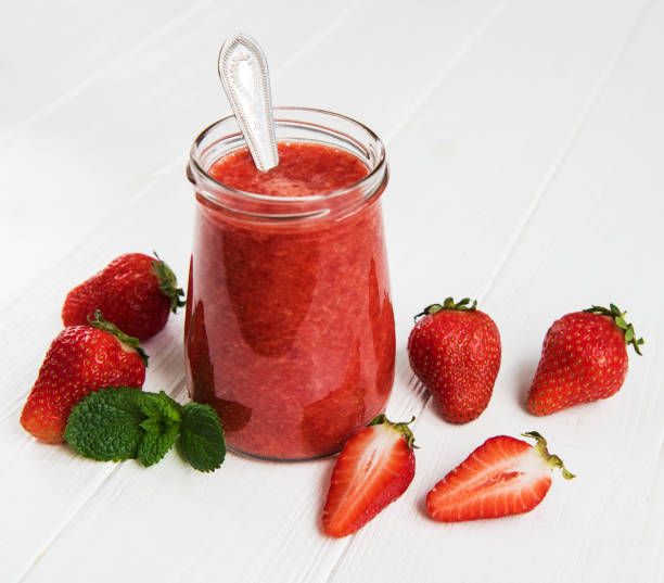 istock Jar with strawberry smoothie 995276494