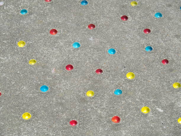 istock Marbles buried in the ground 995282114