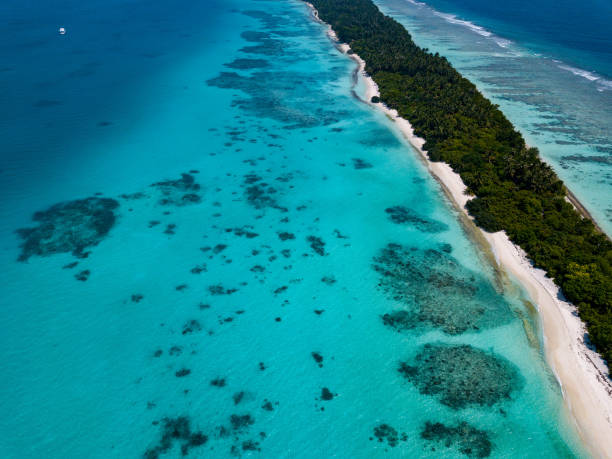 istock Maldives aerial view panorama landscape white sand beach 995282324