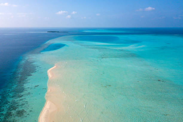 istock Maldives aerial view panorama landscape white sand beach 995282848
