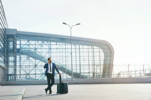 istock Business Man Talking On Mobile Phone Outdoors 995285210