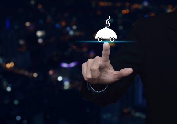 Businessman pressing restaurant cloche flat icon over blur colorful night light city tower, Food delivery concept