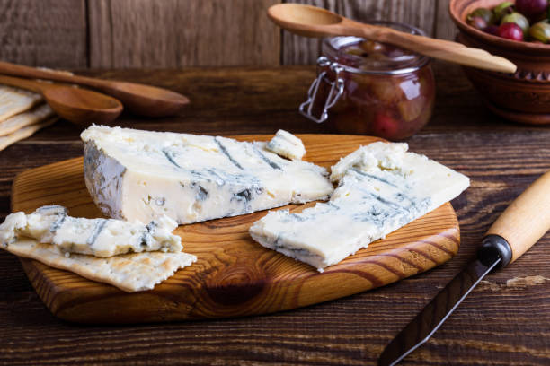 istock Blue Gorganzola cheese served with fresh gooseberries 995295658