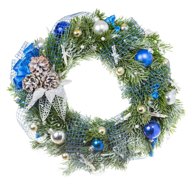 istock Christmas wreaths with decorations cones and balls shallow DOF 995298900