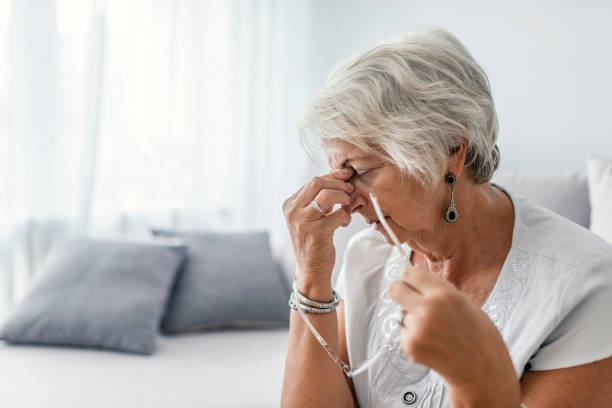istock Senior woman with headache 995301720
