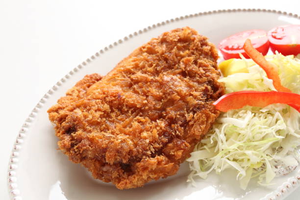 istock homemade pork cutlet served with cabbage 995305272