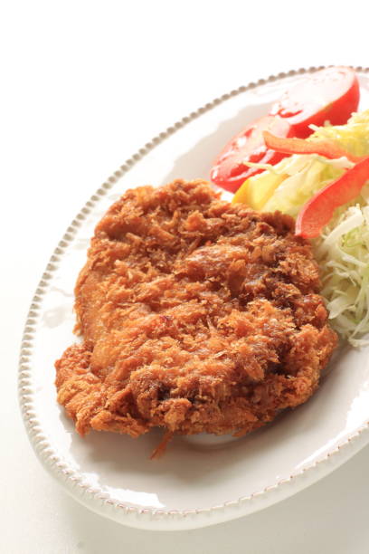 istock homemade pork cutlet served with cabbage 995305346