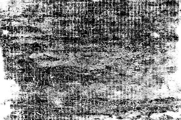 istock Grunge is black and white. Abstract monochrome background. Pattern of cracks, chips, scuffs, dust, stains 995305594