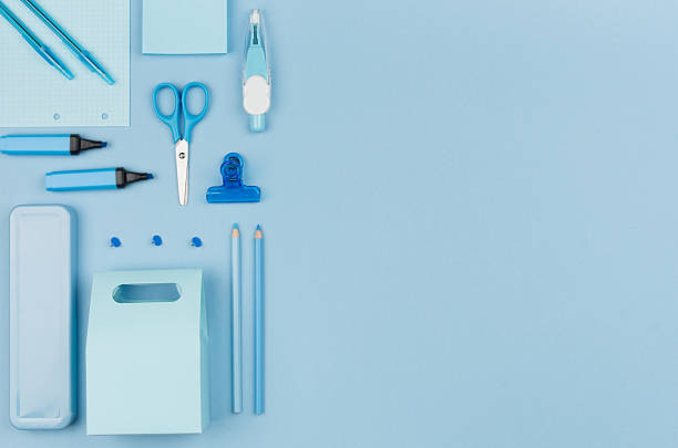 istock Pastel blue office stationery collection on soft elegance blue background with copy space, top view. 995309986