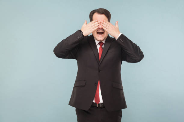 istock Man closed eyes and don't see any more 995313116