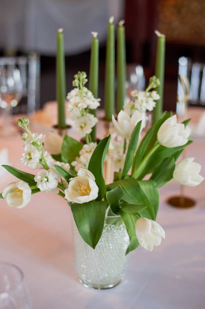 istock Classic table setting. White tablecloth.Vase with hydrogel and white flowers 995319454