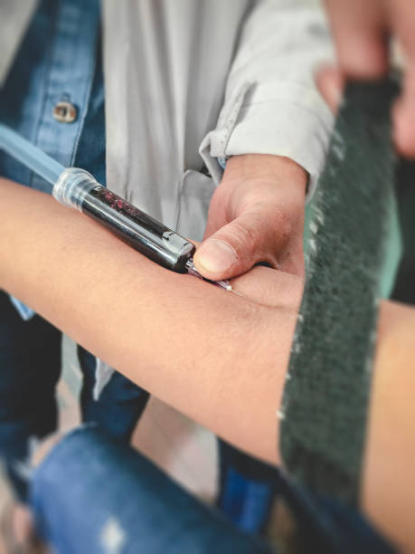 istock Nurse takes blood sample. 995319884