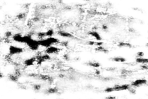 istock Grunge is black and white. Abstract monochrome background. Pattern of cracks, chips, scuffs, dust, stains 995323280