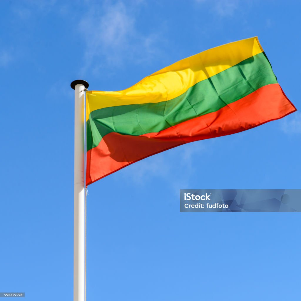 flag of Lithuania flag of Lithuania against the blue sky Lithuania Stock Photo