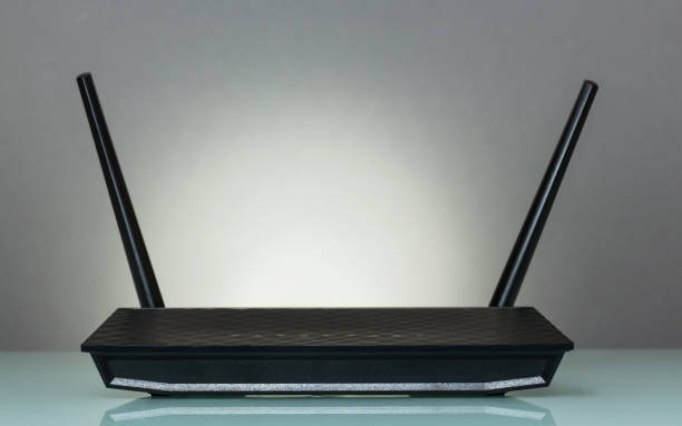 istock Router for wireless connection of devices to the Internet, on gray 995348596
