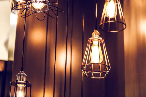 istock Vintage lighting lamp. Lamp light a fuel burning illumination, (electrical component), a replaceable component that produces light, used for Interior Decoration 995359450