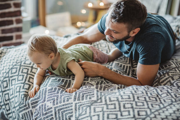 istock Father and daughter spend time together at home 995382092