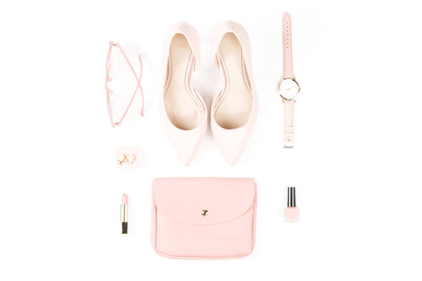 fashion blogger workspace flat lay with pumps, cosmetics, purse, planner book. - earring multi colored shoe jewelry imagens e fotografias de stock