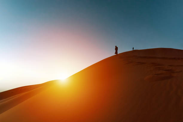 istock Sunset on top of the desert sand dune 995409260