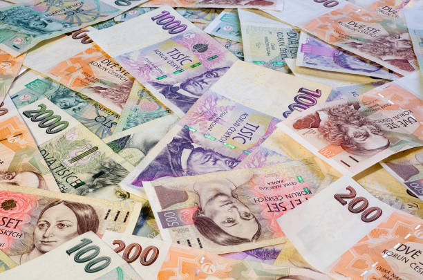 istock Czech crowns of different denominations spread out chaotically 4 995429438