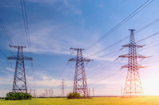 istock high-voltage power lines at sunset. electricity distribution station . 995439288