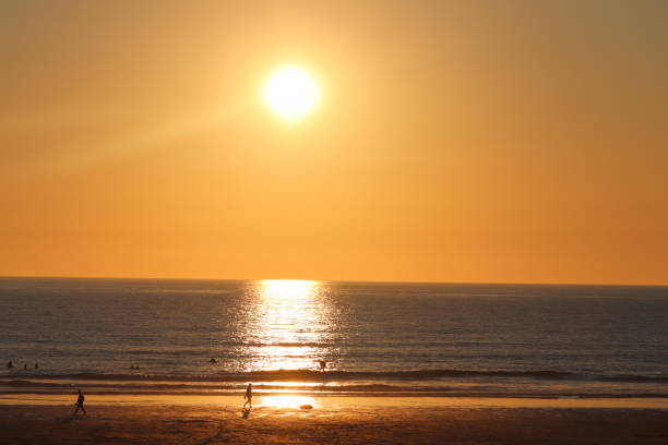 istock Sunset on fistral beach newquay Cornwall England. 995454870
