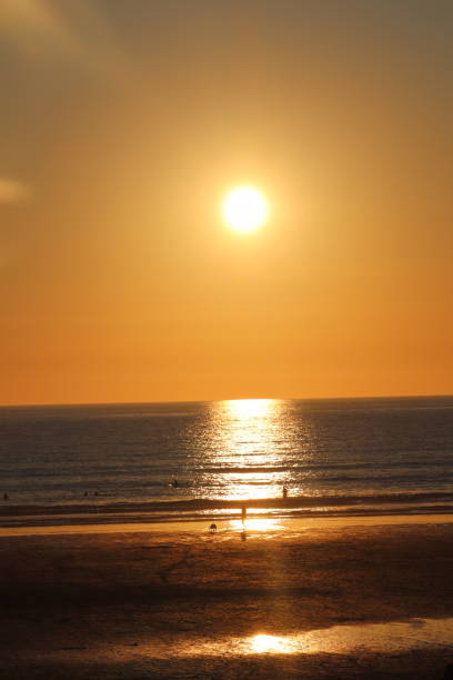 istock Sunset on fistral beach newquay Cornwall England. 995454908