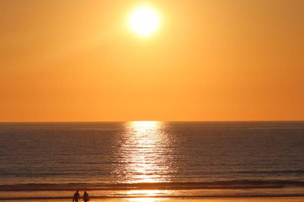 istock Sunset on fistral beach newquay Cornwall England. 995455074