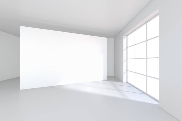 istock White billboard in an empty office with large windows and beautiful diffused light from the window. 3D rendering 995458634