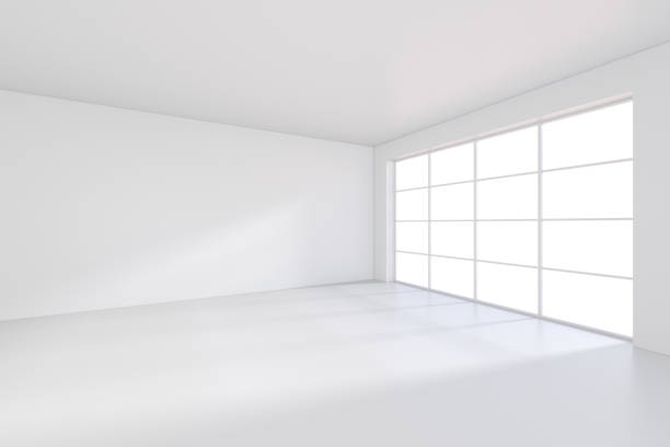 istock Large room with windows and falling light from the window to the floor. 3D rendering 995458830
