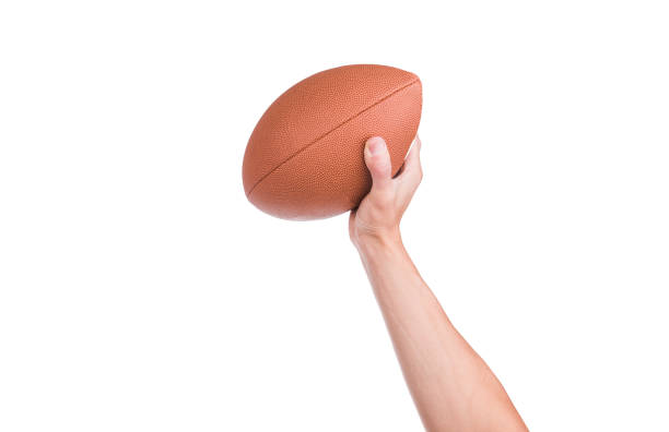 istock Man throwing the football 995464608