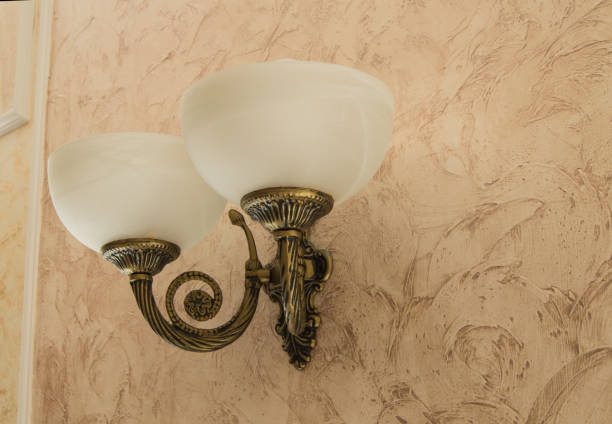 istock Elegant vintage wall lamp with bronze or brass finish 995468404