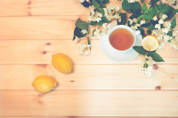 istock Green tea, lemon and jasmine flowers 995471756