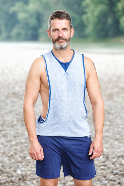 istock handsome bearded athlete standing outdoors 995485486
