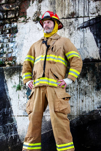 istock portrait of handsome fireman in uniform 995498084