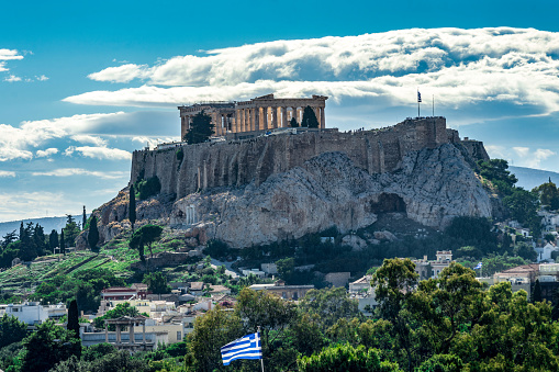 Acropolis view from behind, with clouds in the sky, Athens, Greece
