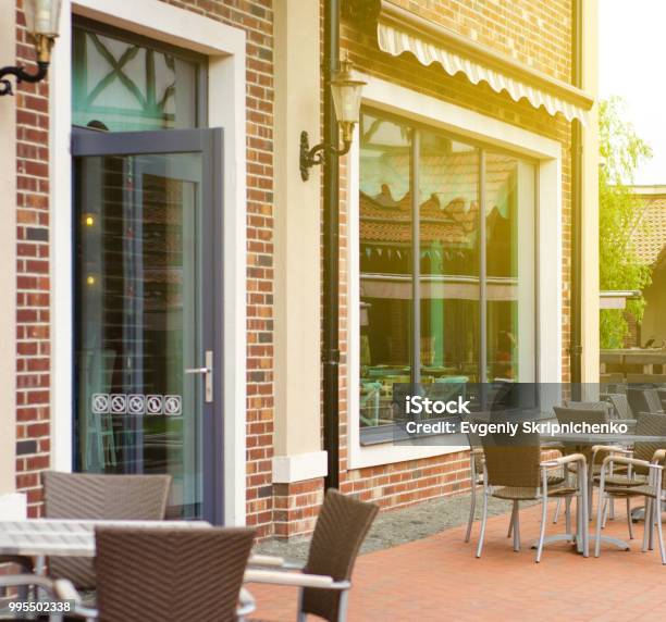 Cafe Entrance Tables Tables Stock Photo - Download Image Now - Building Entrance, Cafe, Store