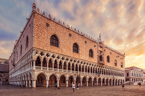 Exterior view of the Doge's Palace in Venice in Italy an early summer morning. The palace was established in the 14th century and has been a museum since 1923.