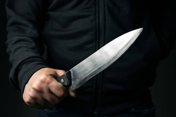 Man and knife Man and knife assassination photos stock pictures, royalty-free photos & images