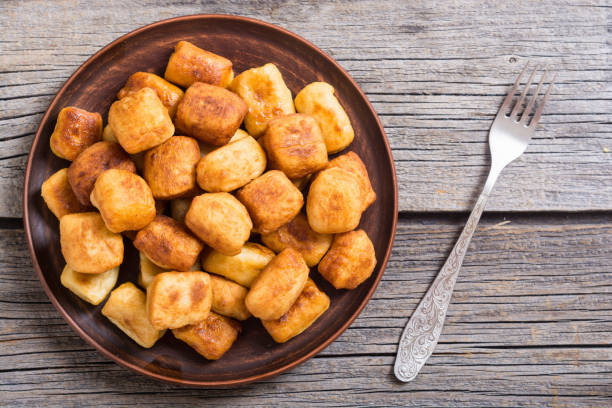 istock Homemade fried potatoes gnocchi 995539336