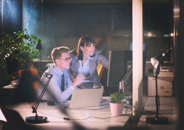istock young designers in the night office 995576644