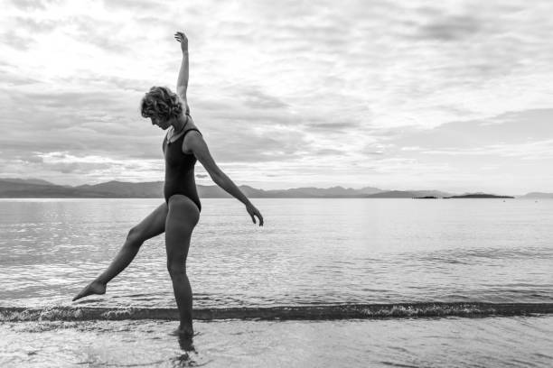 istock young woman having fun on the beach 995595334