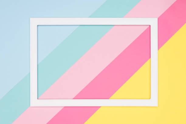 Abstract geometrical pastel blue, pink and yellow paper flat lay background. Minimalism, geometry and symmetry template with empty picture frame mock up. Abstract geometrical pastel blue, pink and yellow paper flat lay background. Minimalism, geometry and symmetry template with empty picture frame mock up. central vietnam stock pictures, royalty-free photos & images