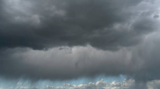 istock Rainy, dark storm clouds over the sea 995617014