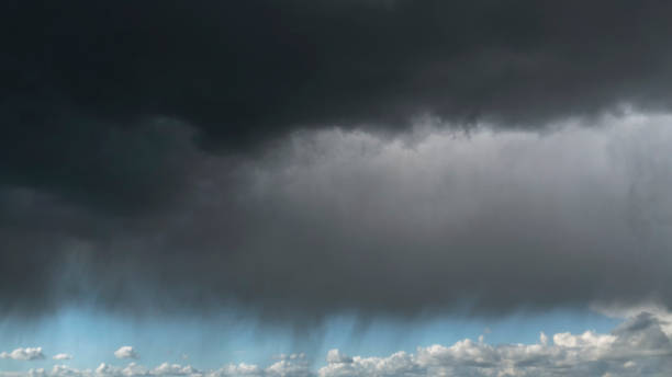 istock Rainy, dark storm clouds over the sea 995617054