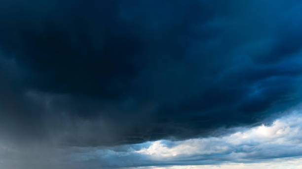 istock Rainy, dark storm clouds over the sea 995617268