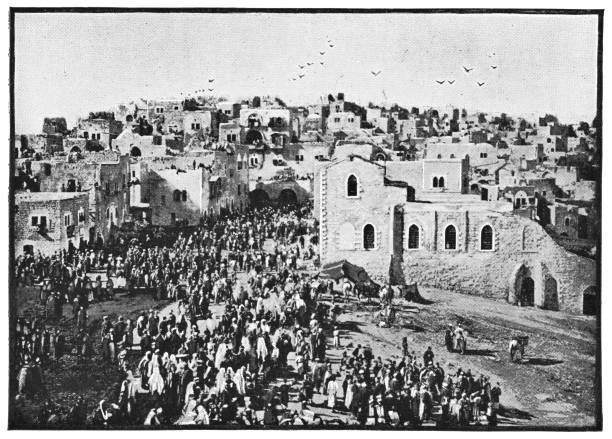 Large group of people on a pilgrimage in Bethlehem, Israel. Vintage halftone etching circa late 19th century. Bethlehem is part of modern day Palestine, West Bank.