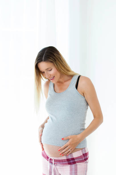 istock beautiful pregnant woman 995633124