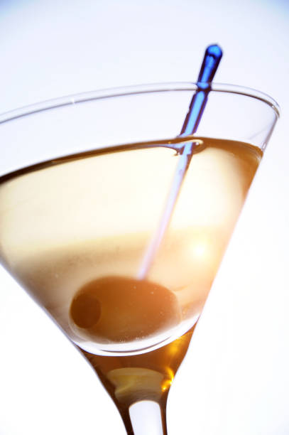 istock Dry Martini Cocktail with Olive on White 03 995658712