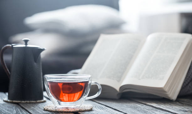 istock still life a cup of tea with a book 995683588
